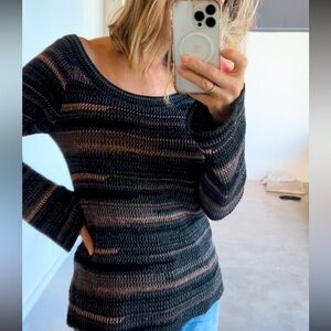 Beautiful knit sweater. Never worn last one from my boutique